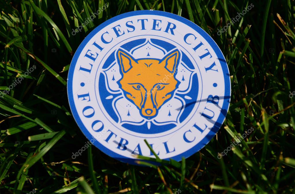 September 6, 2019 Istanbul, Turkey. The emblem of the English football club Leicester City on the green grass of the football field.
