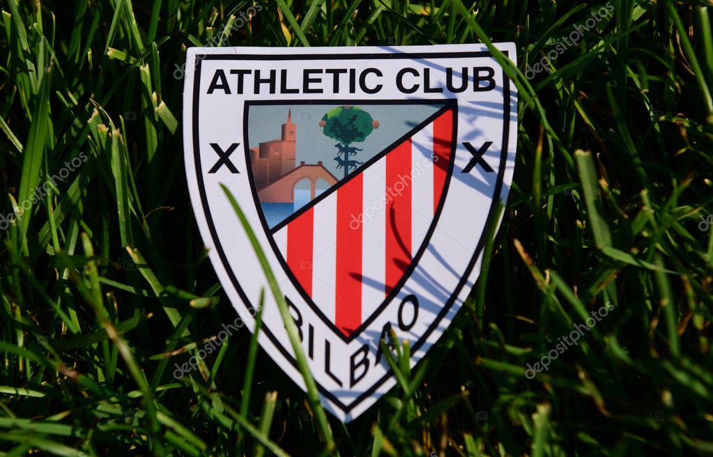 September 6, 2019 Istanbul, Turkey. The emblem of the Spanish football club Athletic Bilbao on the green grass of the football field.