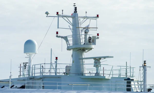Radar tower on a modern multi-deck sea ferry.