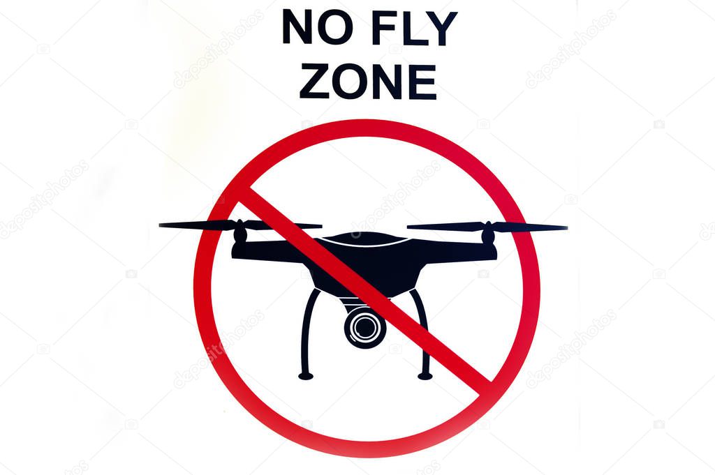 Signboard NO FLY ZONE  with a picture of a dithered droning.