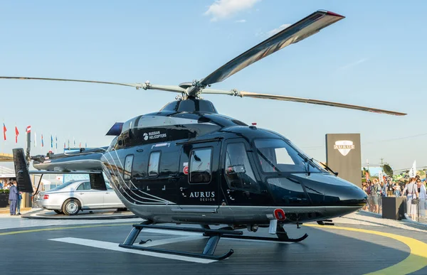 30 Ağustos 2019 Zhukovsky, Rusya. Aurus dizaynındaki Ansat helikopteri MAKS-2019 Uluslararası Havacılık ve Uzay Salonu 'nda..