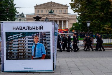 August 31, 2013 Moscow, Russia. A banner with the election symbols of Russian politician Alexey Navalny on Theater square in front of the Bolshoi theater in Moscow. clipart