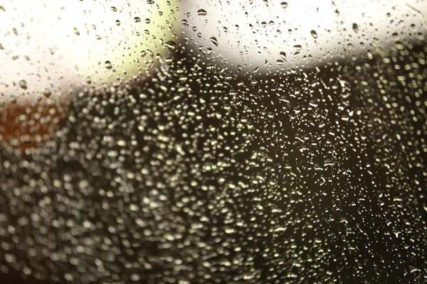 Gocce di pioggia sul vetro — Foto Stock