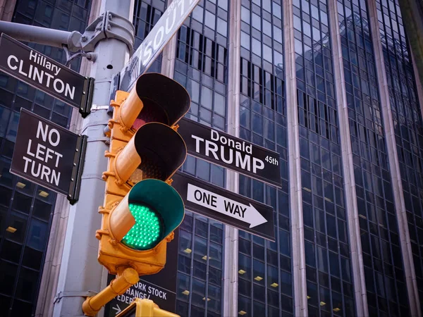 New York Wall street yellow traffic light black white fake pointer guide : political double sense : Green light, one way green light to Donald Trump, 45th USA american president, No turn to Hillary Clinton policy — Photo