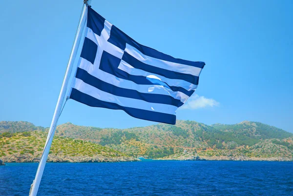 Прапор Греції складається з кольори синіми та білими стрічками і білого Хреста - символ синього моря і біле море накипу або небо. Національний прапор Греції. Греція відпочинок відпочинок тури — стокове фото