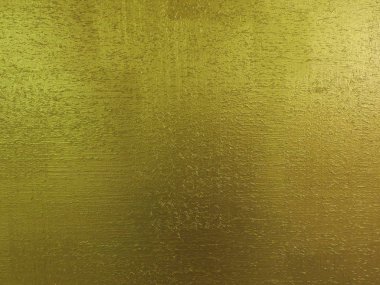 Tahta talaş parçacıkları çizik gibi sarı altın arkaplan dokusu. Fırça boyalı ahşap yüzey. Altın desenli arka plan. Altın plaka, ahşap duvar.
