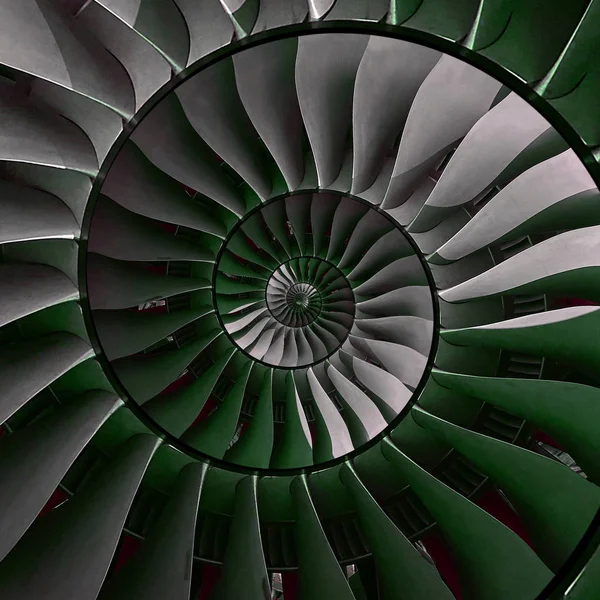 Turbine blades wings spiral effect abstract fractal pattern background. Spiral industrial production metallic turbine background. Turbine manufacturing technology abstract fractal pattern staircase
