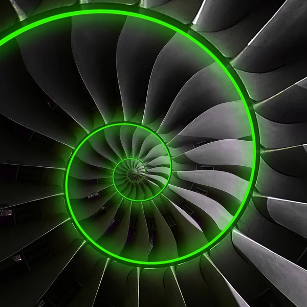 Turbine blades wings spiral green neon glow effect abstract fractal pattern background. Spiral industrial production metallic turbine background. Turbine technology abstract fractal pattern