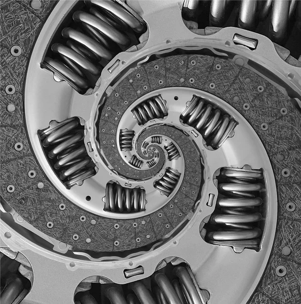 Abstract composite truck car clutch disc spiral fractal pattern background. Car clutch part twisted spiral distorted fractal background. Truck clutch disc fractal background. Industrial repetitive metallic round circle background. Car springs