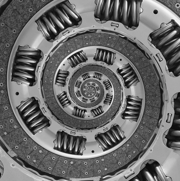 Abstract composite truck car clutch disc spiral fractal background. Car part twisted distorted background. New truck clutch spiral fractal background. Distorted car part detail. Abstract car component