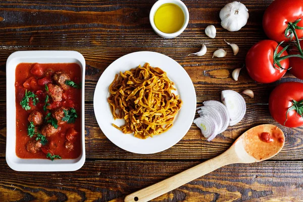 homemade Italian pasta with red sauce with meatballs