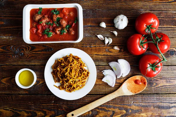 homemade Italian pasta with red sauce with meatballs