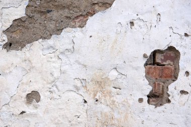 Eski, yıpranmış beyaz arka plan dokusu. Eski alçılı tuğla duvar.