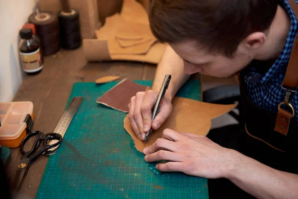 Male Hands Master Cutting Knife Pattern Brown Genuine Leather Overhead — Stock Photo, Image