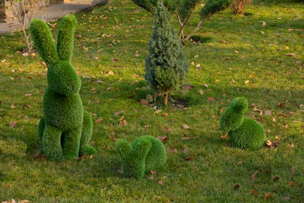 Figures for a garden made of artificial grass, topiary figures