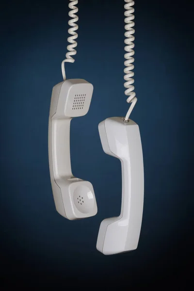 Hanging Phone Receivers Background — Stock Photo, Image