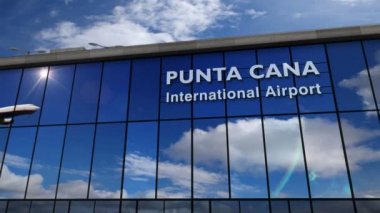 Punta Cana, Dominik Cumhuriyeti 'ne iniş yapan jet uçakları animasyonu canlandırıyor. Cam havaalanı terminali ve uçağın yansıması ile şehre varış. Seyahat, iş, turizm ve ulaşım kavramı.