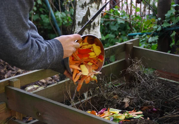 Kitchen waste recycling in composter — Stock Photo, Image