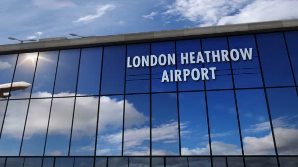 ジェット機はロンドン ヒースロー イングランド イギリス 3Dレンダリングアニメーションに着陸します 空港ターミナルと飛行機の反射で街に到着 ビジネス 交通の概念 — ストック動画
