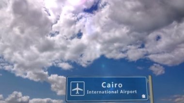 Jet uçağı Kahire, Mısır 'a iniyor. Havaalanı istikameti işaretli şehir gelişi. Seyahat, iş, turizm ve ulaşım konsepti. 3B canlandırma canlandırması.