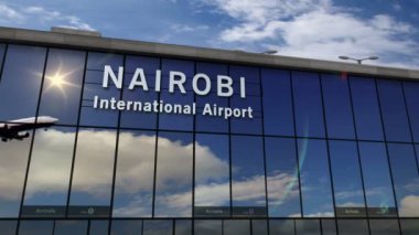 Kenya, Nairobi 'ye iniş yapan bir jet uçağı canlandırma yapıyor. Cam havaalanı terminali ve uçağın yansıması ile şehre varış. Seyahat, iş, turizm ve ulaşım kavramı.