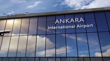 Ankara, Türkiye 'ye üç boyutlu bir jet uçağı iniyor. Cam havaalanı terminali ve uçağın yansıması ile şehre varış. Seyahat, iş, turizm ve ulaşım kavramı.
