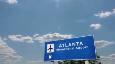 Jet uçağı Atlanta, Georgia, ABD 'ye iniyor. Havaalanı istikameti işaretli şehir gelişi. Seyahat, iş, turizm ve ulaşım konsepti. 3B canlandırma canlandırması.