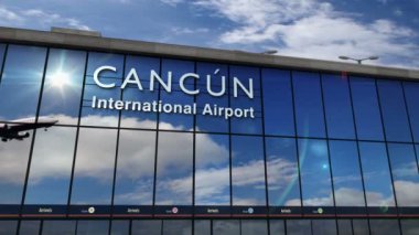 Meksika, Cancn 'e iniş yapan bir jet uçağı canlandırma yapıyor. Cam havaalanı terminali ve uçağın yansıması ile şehre varış. Seyahat, iş, turizm ve ulaşım kavramı.