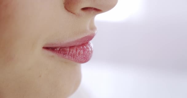 Pink lips of young woman . fashion model lips. Sexy female lips. Model makeup, female lips smile — Stock Video