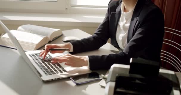 Tired Businesswoman or accountant working on laptop computer to calculate business data, accountancy document at office, business concept — Stock Video