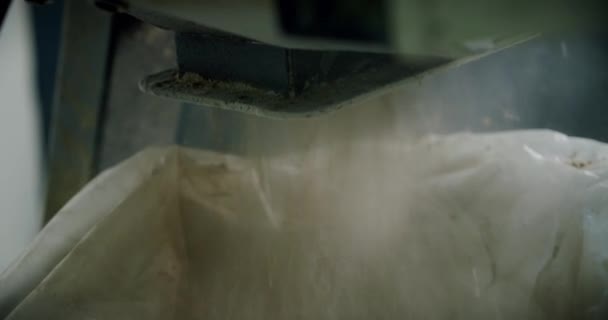 Close up. barley malt ground in a mill for beer production Slow motion — Stock Video