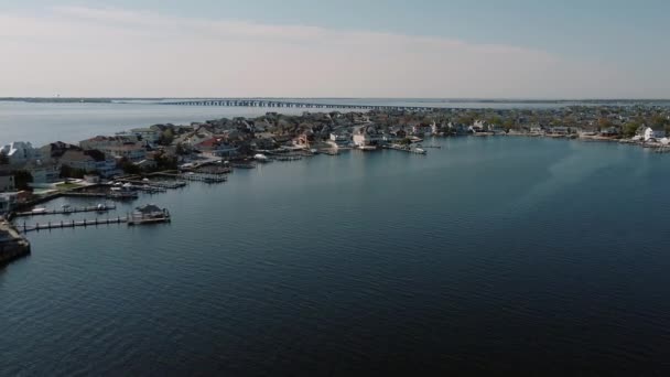 Aerial shot of neighborhood, suburb. flying over the pier with boats Real estate, Connecticut River. USA — Stock Video