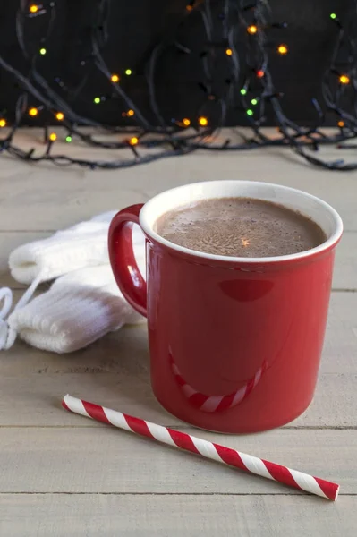 Cocoa in a red Cup and mittens. — Stock Photo, Image