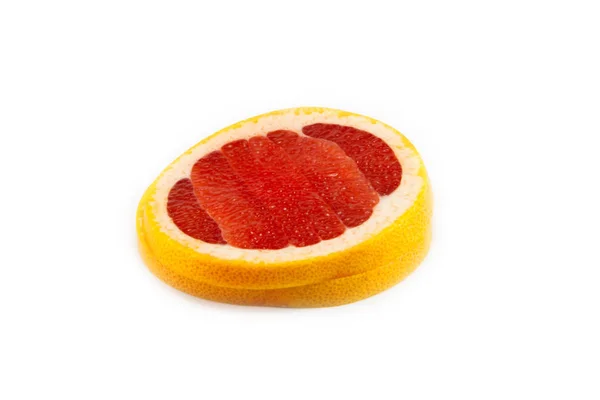 Грейпфрут нарезанный и сложенный — стоковое фото