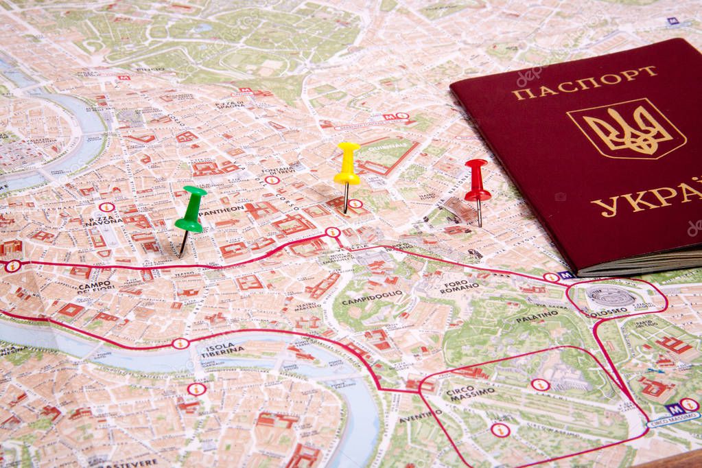 Passports on a map of the Rome