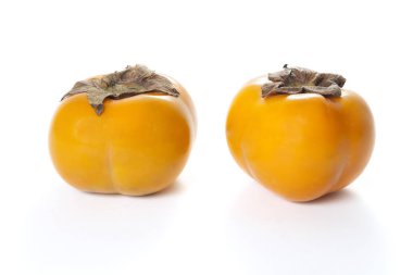 İki Diospyros kaki meyve