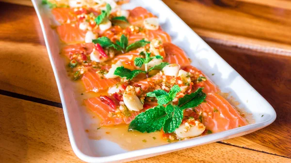 Salmon with spicy Thai style sauce — Stock Photo, Image