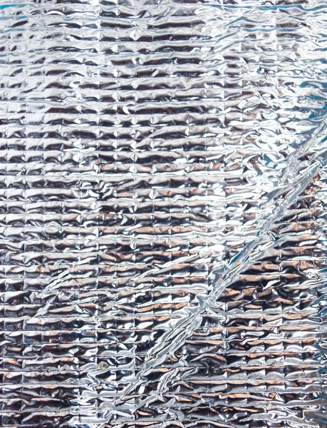 Stäng upp mönster aluminiumfolie konsistens bakgrund — Stockfoto
