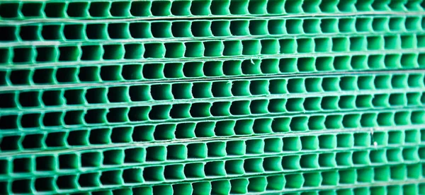 Grunge verde tejido metálico rejilla rayas fondo abstracto, enfoque sensible —  Fotos de Stock