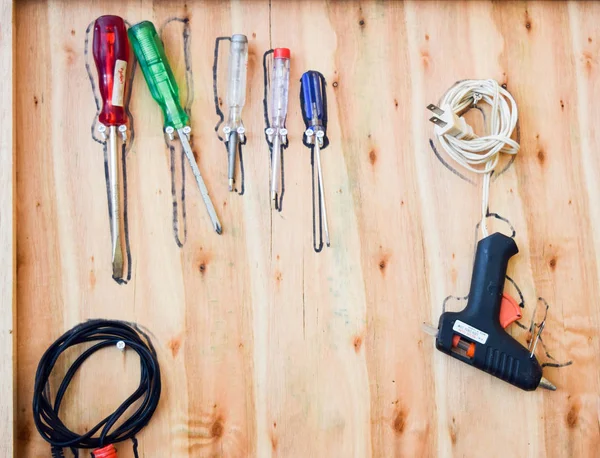 Assorted work tools on wood — Stock Photo, Image