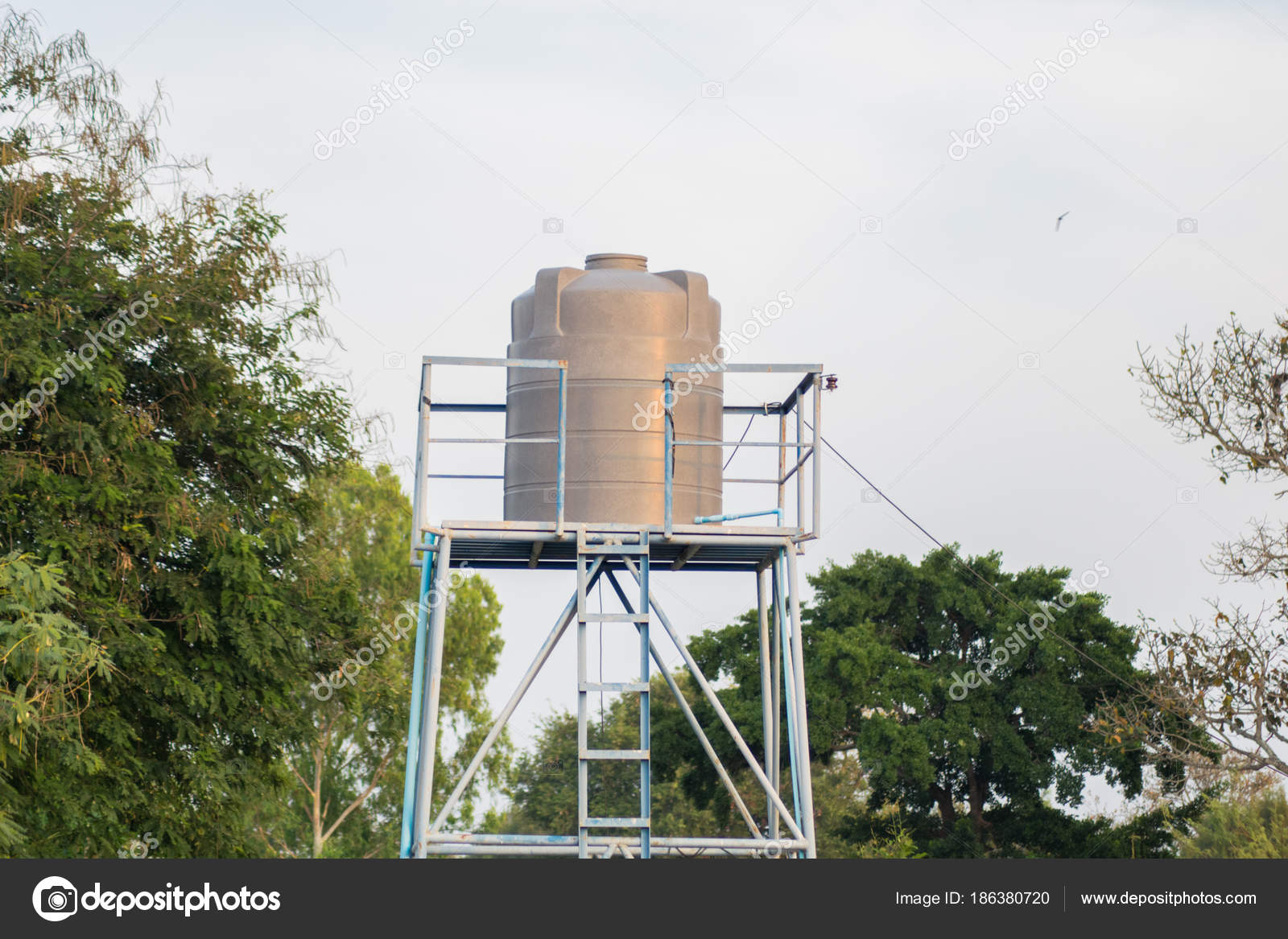 Water Tank House Sky Background Stock Photo by