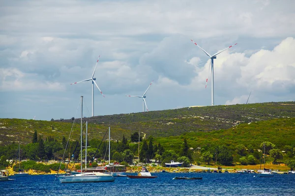 Wind mill turbines on beautiful sky background — Stock Photo, Image