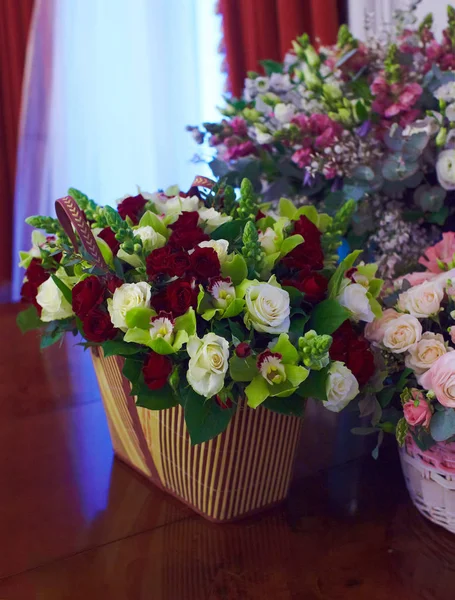 Baskets of flowers on celebration event hall