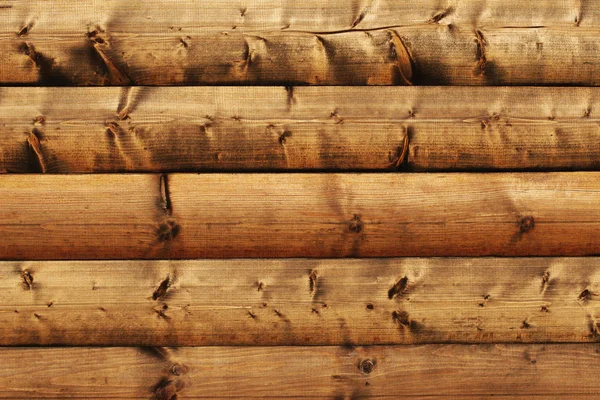 Trä vägg textur från runda stockar — Stockfoto