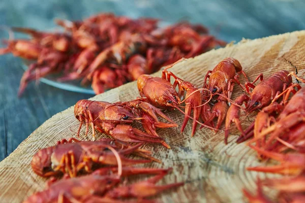 Crawfish cooked and served on wooden background — Stock Photo, Image