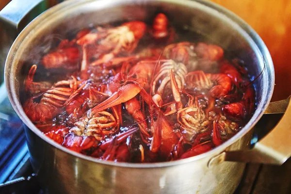 Crawfish cooking boiling in pot with spices — Stock Photo, Image