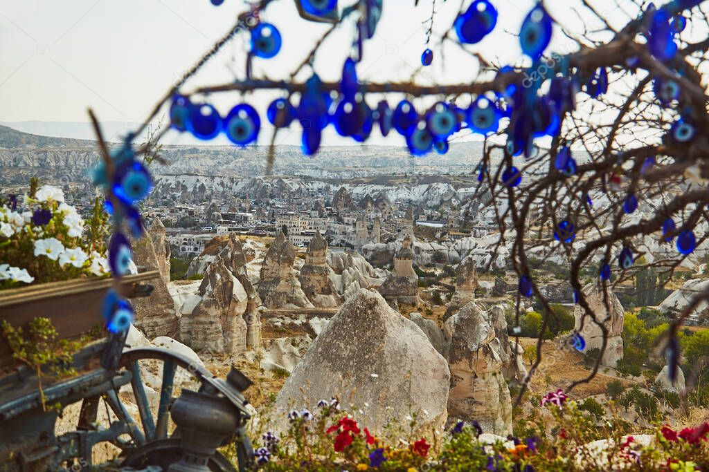 Tree with amulets on hill with Cappadocia view in Turkey