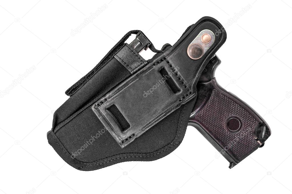 The gun in the holster. Isolated