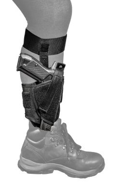 The gun in the tactical on-shin holster. Isolated clipart