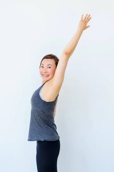 Yoga students showing different yoga poses — Stock Photo, Image